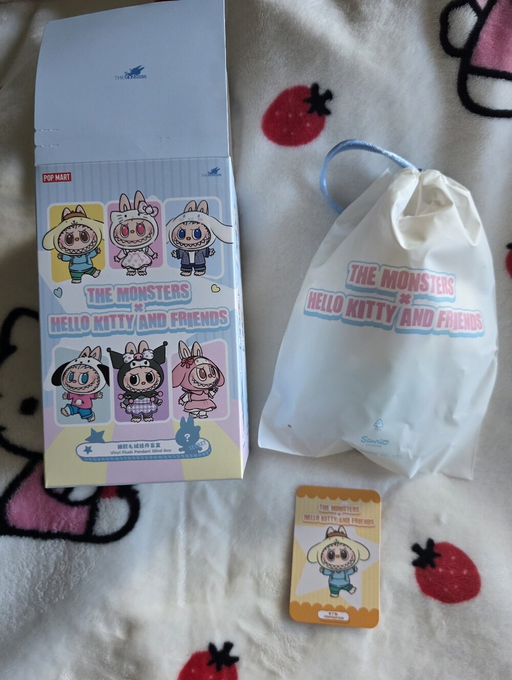 The Monsters x Hello Kitty and Friends Pompompurin Labubu